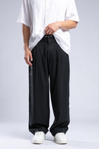 Pantaloni largi din in cu pense