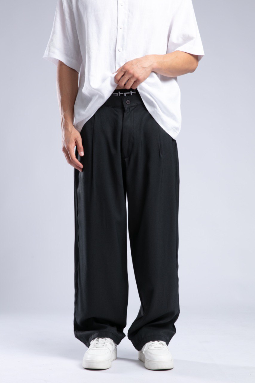 Pantaloni largi din in cu pense